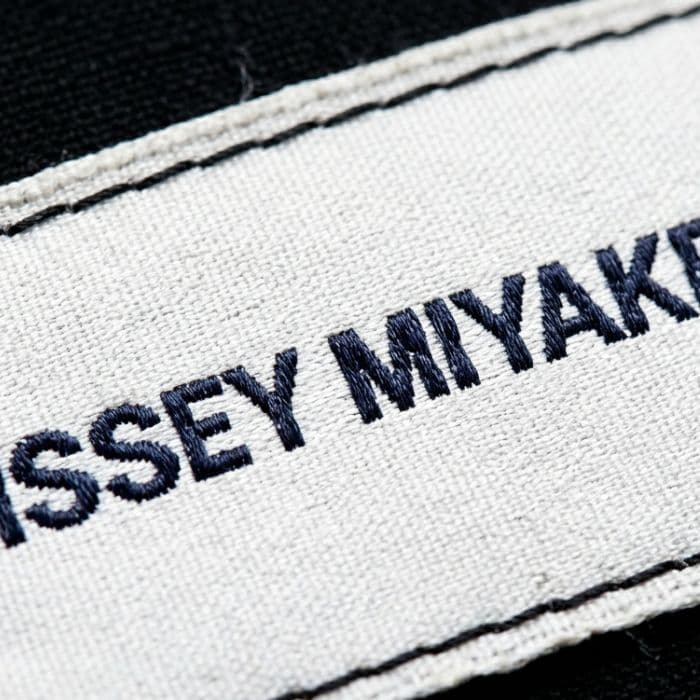 Detail of vintage designer labels and stitching